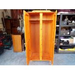 A good quality pine wardrobe,