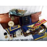 A large quantity of Masonic regalia contained in two leather cases (2)