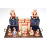 Two Royal Doulton limited edition Father Christmas toby jugs, and eight Bunnykins figures,
