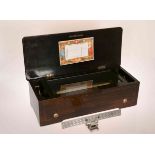 A 19TH CENTURY INLAID ROSEWOOD MUSIC BOX, the rectangular case with simulated rosewood sides,
