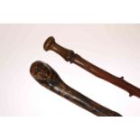 A 19TH CENTURY THORN WALKING STICK, with pointed cast iron ferrule,
