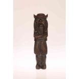 A FRENCH CARVED WOODEN NUTCRACKER, late 19th Century, modelled as a Breton man. 20.