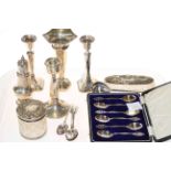 Cased silver teaspoons, silver candlesticks, vase, caster,