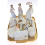 Collection of fourteen Lladro pieces (figures, animals,