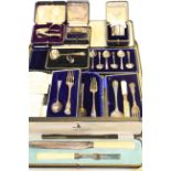 Collection of boxed flatware and napkin rings,