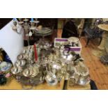 Large collection of silver plated ware including candelabrum, tea service, cakestands, flatware,