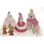 Three Royal Doulton figures, three Hummel figures,