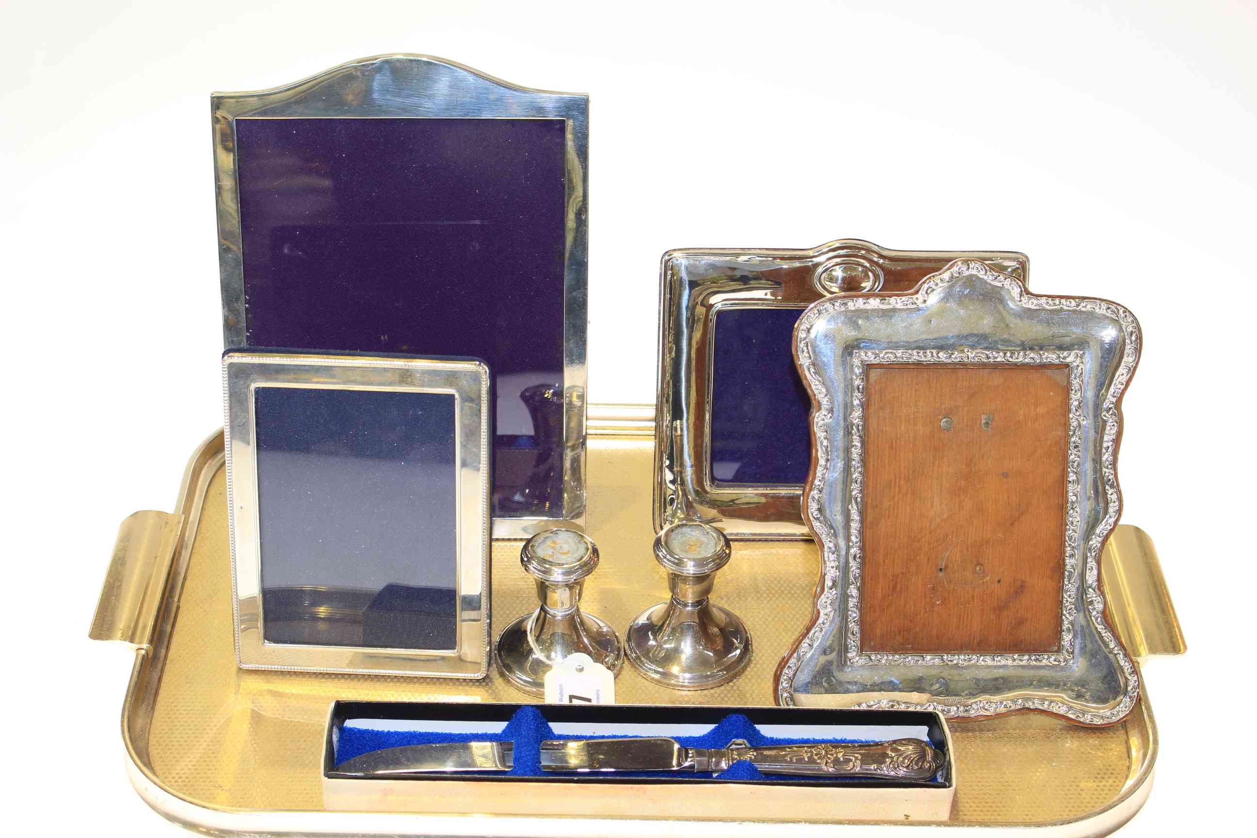 Three silver and sterling silver photograph frames,