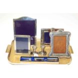 Three silver and sterling silver photograph frames,