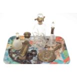 Silver collared glass decanter, three silver and glass toilet jars, hand mirror,