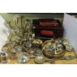 Large collection of silver plate and flatware including canteens, spill vases,