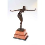 Modern bronze of an Art Deco dancing lady on marble plinth,