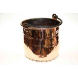 Highly polished copper log bin with cast handle