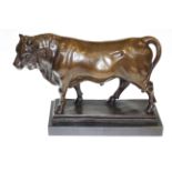 Large modern bronze of a bull on marble plinth