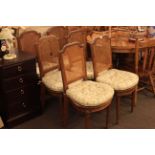 Set of six French oak bergere panel back salon chairs