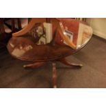 Regency style oval mahogany pedestal coffee table