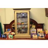 Table top display cabinet, collection of model vehicles, military figures,
