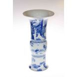 Chinese Gu shaped blue and white vase with figural decoration having blue circle marks to the base