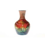 Moorcroft flambe vase decorated with fuschia