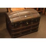 Vintage dome topped canvas and wood bound cabin trunk