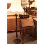 Neat walnut inverted breakfront three drawer bureau and standard lamp and shade (2)