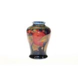Small Moorcroft pomegranate vase (a/f)