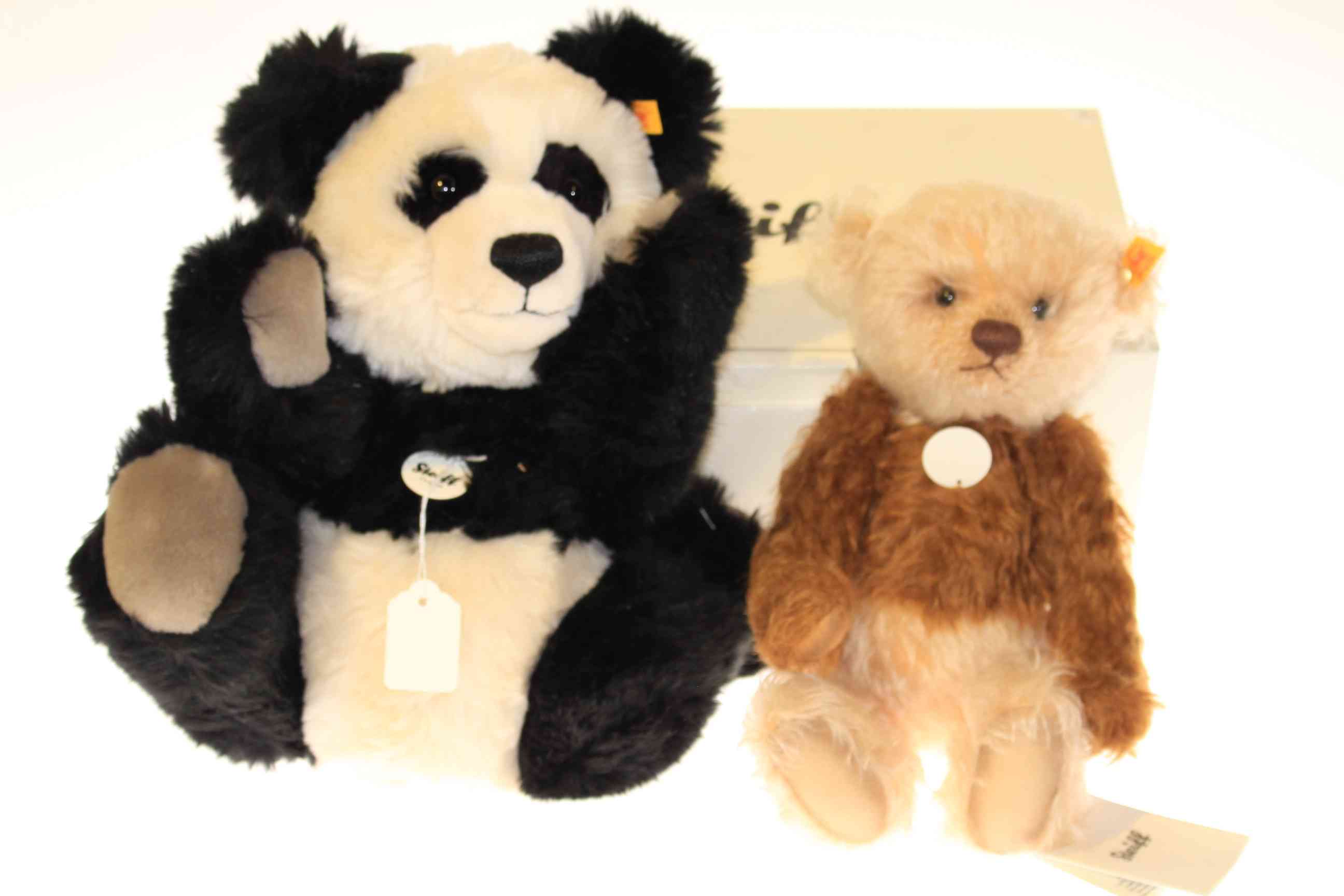 Boxed Steiff teddy and Steiff Panda bear