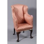 A 19TH CENTURY HIGHBACK WING CHAIR IN GEORGE II STYLE,