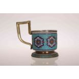 A RUSSIAN SILVER AND ENAMEL TEA GLASS HOLDER, Moscow 1896, assay master Lev Fridrikhovich Oleks,