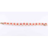 A CORAL AND CULTURED PEARL BRACELET,