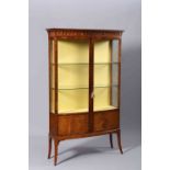 AN EDWARDIAN MAHOGANY VITRINE IN GEORGE III STYLE, bow fronted,