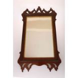 A GEORGE III MAHOGANY FRETWORK MIRROR IN CHIPPENDALE STYLE,