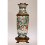 A CHINESE PORCELAIN AND METAL MOUNTED LAMP BASE,