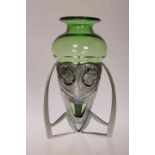 LIBERTY & CO, A TUDRIC PEWTER AND GREEN GLASS VASE BY ARCHIBALD KNOX,