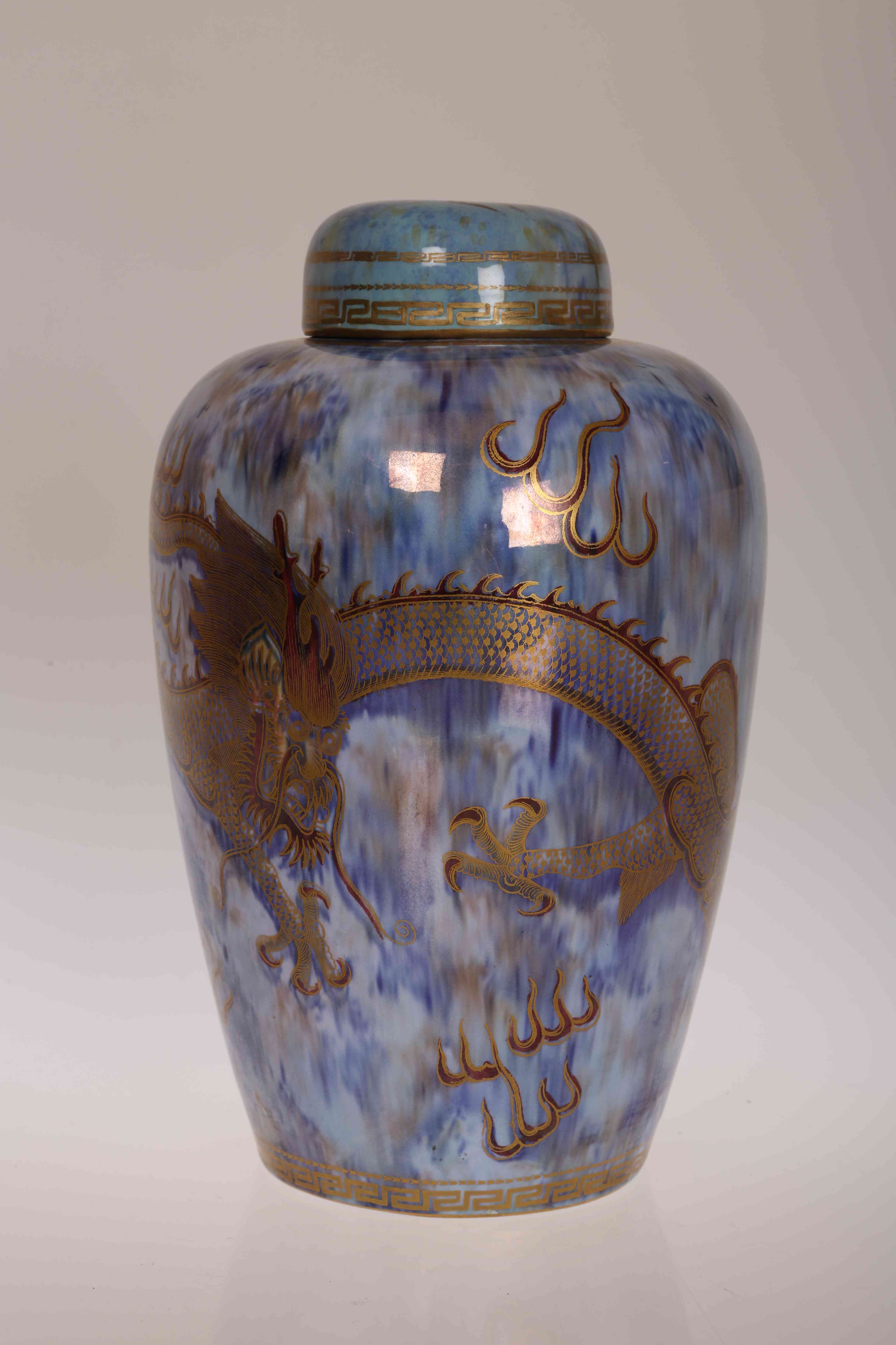 A WEDGWOOD LUSTRE VASE AND COVER, decorated with a dragon on a blue lustre ground, pattern no.