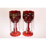 A PAIR OF VICTORIAN CRANBERRY GLASS LUSTRES,