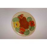 A CLARICE CLIFF "NASTURTIUM" PLATE, printed factory marks to base and incised no. 32.