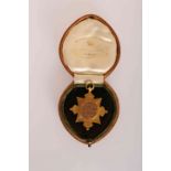 A 15 CARAT GOLD MOUNTED SHOOTING MEDAL, awarded to Walter W.