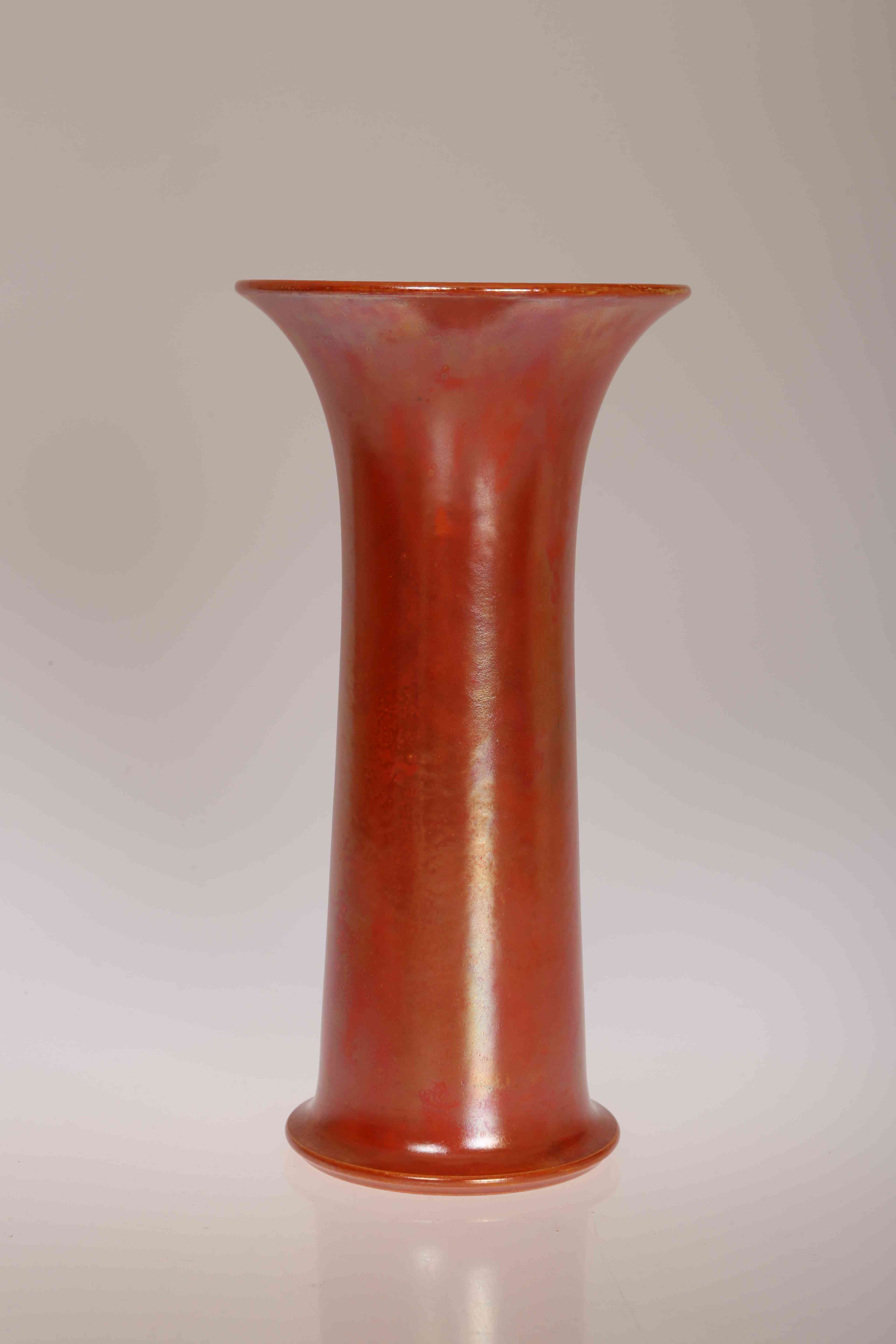 A RUSKIN POTTERY TRUMPET VASE, with orange lustre glaze, stamped Ruskin, England, 1925 to base.