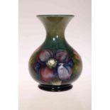 A MOORCROFT POTTERY VASE, tubelined and hand painted with Clematis,