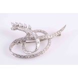 A DIAMOND BROOCH,