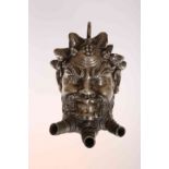 A CONTINENTAL WHITE METAL INCENSE BURNER IN THE FORM OF A BACCHUS MASK,