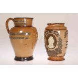 TWO DOULTON LAMBETH SALT GLAZED STONEWARE JUGS, the first commemorating Benjamin Disraeli,