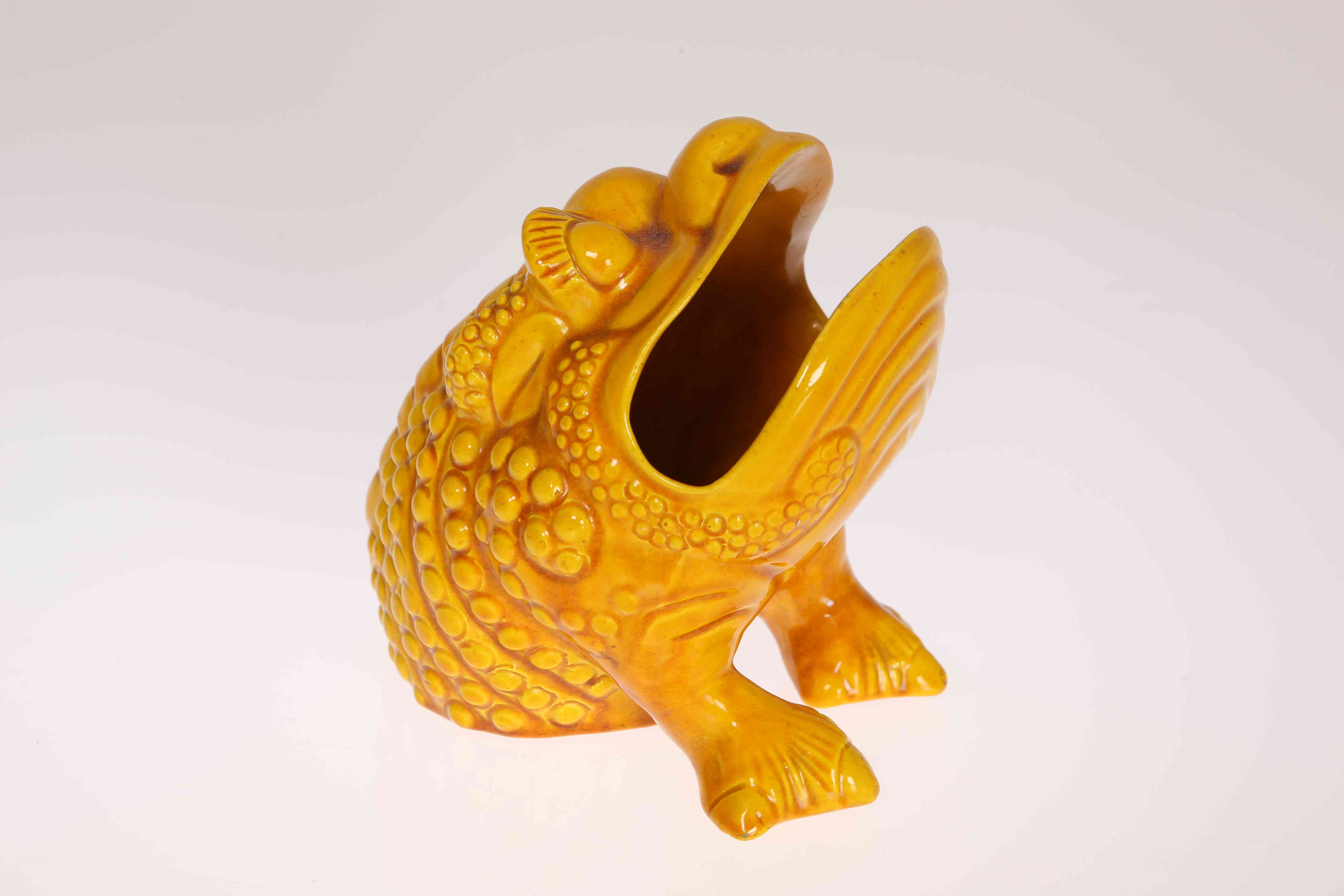 A BURMANTOFTS GROTESQUE SPOON WARMER, LATE 19TH CENTURY, in the form of a toad, yellow glazed, no.