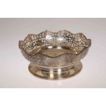 AN EDWARDIAN SILVER BOWL, William Aitken, Birmingham 1905, circular, with pierced and shaped rim,