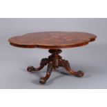 A FINE VICTORIAN BURR WALNUT LOO TABLE, the lobed oval top with moulded edge and quarter veneers,