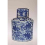 A CHINESE BLUE AND WHITE PORCELAIN JAR AND COVER, cylindrical, painted with fish.