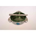 LIBERTY & CO, A TUDRIC PEWTER AND GREEN GLASS BUTTER DISH, DESIGNED BY ARCHIBALD KNOX,