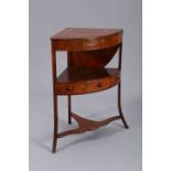 A GEORGE III MAHOGANY CORNER WASHSTAND, demilune, with hinged top,