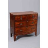 A REGENCY MAHOGANY BOW FRONTED CHEST OF DRAWERS OF SMALL PROPORTIONS,